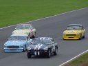Four MGBs competing at Castle Combe