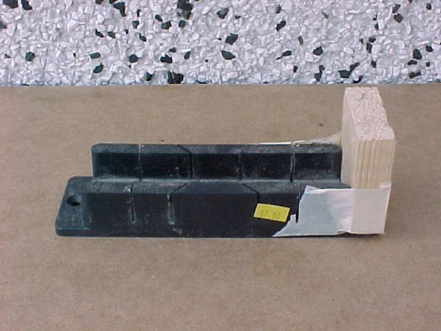 Small mitre block with bits of wood taped on