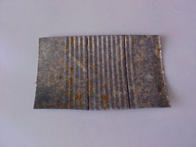 Flattened tin with marking out lines